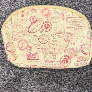 Yellow postage stamp makeup bag